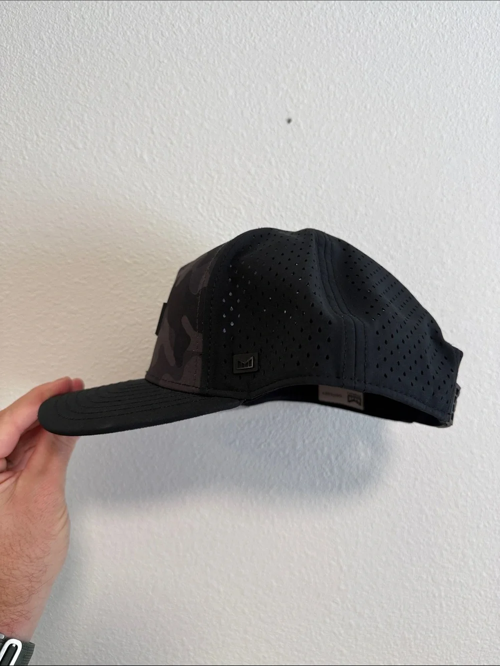 Melin Men’s Black Camouflage Trucker Hat